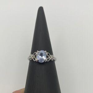 White gold plated Ring with light purple stone!